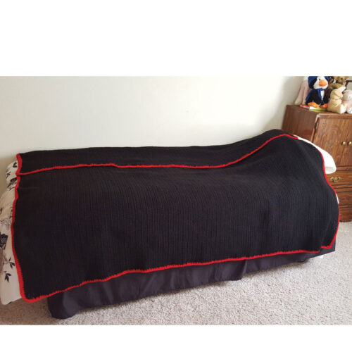 Black blanket with red border